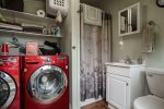 Laundry Room and Extra Bathroom Located in Storage Room in Back Yard